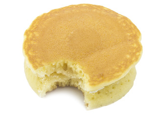 Fototapeta na wymiar Pancake with a Bite Eaten