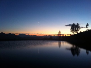 Mountain Lake Sunset Reflection With Moon