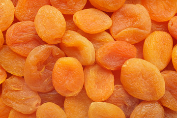 Dried apricots abstract background texture