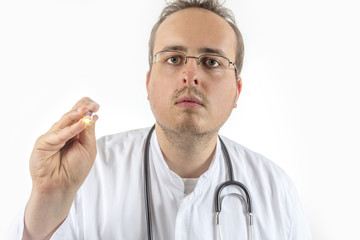 Young Doctor looking with flashlight