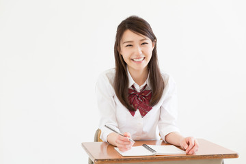 Naklejka premium メモをする学生