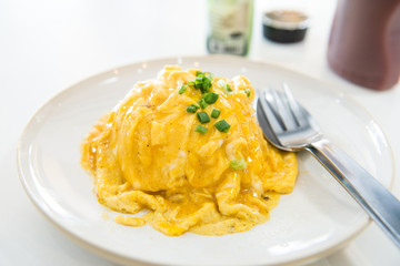creamy omelet on rice