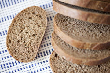 Cut loaf of brown bread