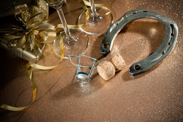 Cork from champagne bottle with a horseshoe