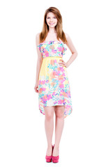 Beautiful young happy woman in light dress.