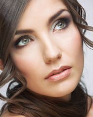 Naklejka premium Beauty woman face close up portrait. Light make up.