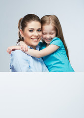 Business woman with kid girl isolated portrait behind white boa