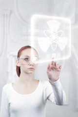 female scientist working in the futuristic laboratory