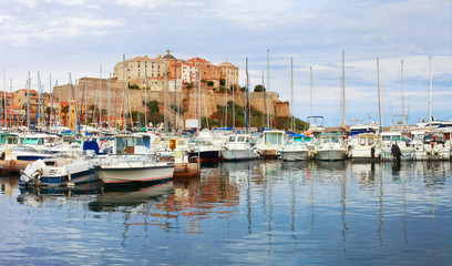 Fototapeta na wymiar Calvi ,Corsica. View of marina with old citadel