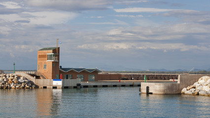 Obraz premium Marina di Pisa sunset view of the port