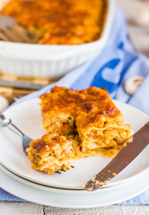 processes food meat lasagna on a white bowl, .Italian food