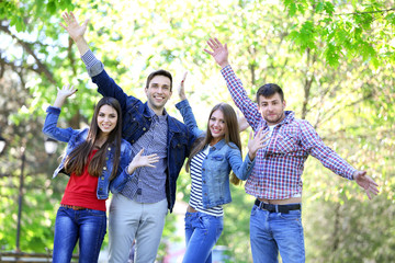 Happy students in park