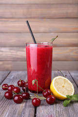 Fresh cold cherry cocktail with mint and lemon