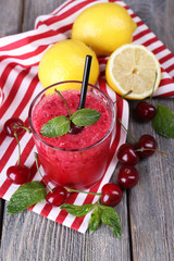 Fresh cold cherry cocktail with mint and lemon