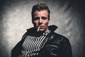Cigarette smoking retro fifties cool rebellion fashion man weari