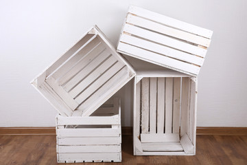 Empty wooden crates in room