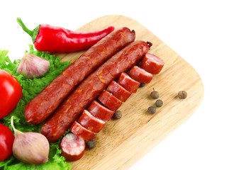 Smoked thin sausages and vegetables