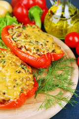 Stuffed red peppers with greens ans vegetables