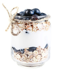 Healthy breakfast - yogurt with  blueberries and muesli served