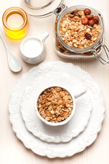 Granola with milk and honey. Healthy breakfast.