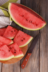 Slice of watermelon on wooden table