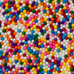 Fototapeta na wymiar Background Rainbow Colored Sprinkles