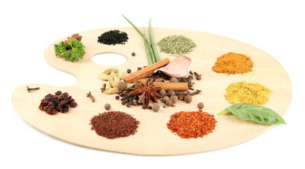 Fototapeta na wymiar Painting palette with various spices and herbs, isolated