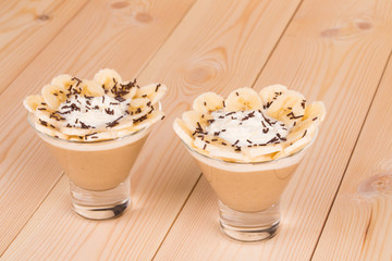 Banana milk smoothie in glass.