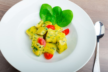 Spinach gnocchi with melted butter