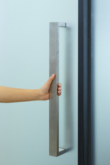 concept hand open door