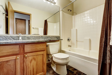 Simple bathroom interior with large mirror