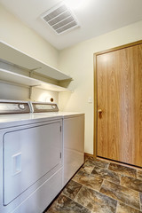 Room with laundry appliances