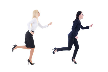 Fototapeta na wymiar two running business women in business suit isolated on white