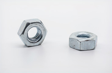 Macro Shot of Two Lying Iron Nuts