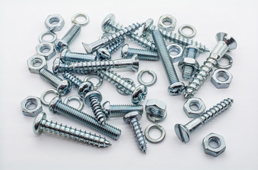 Macro Shot of A Collection Of Iron Screws, Nuts and Lockwashers