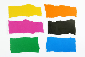 colorful torn paper on white background