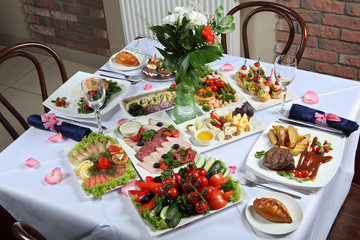 A table set with a variety of dishes