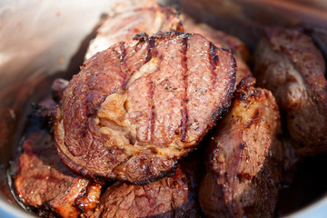 Chunks of meat resting after grill