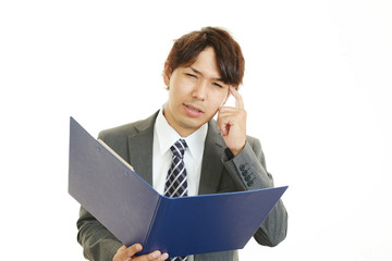 頭痛を訴えるビジネスマン