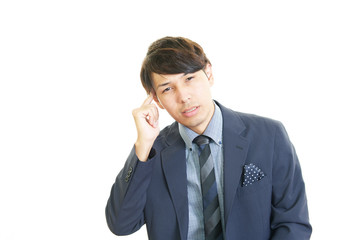 頭痛を訴えるビジネスマン
