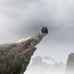 Meditating businessman