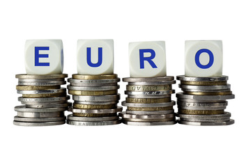 Stacks of coins with the letters EURO isolated on white