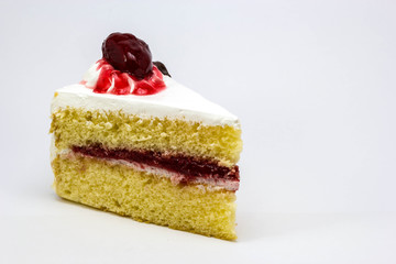 Piece of strawberry cake on white background