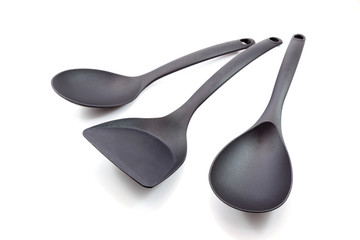 black ladle on white background