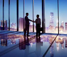 Silhouette of Business People Shaking Hands