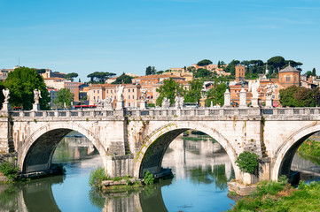 Fototapeta na wymiar St. Angelo Bridge and Trastevere district in Rome, Italy