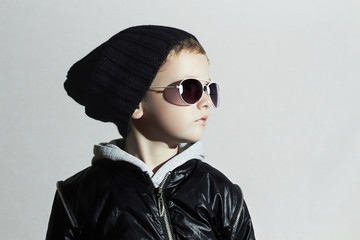 Fashionable child boy in sunglasses.Little boy.Autumn-Winter