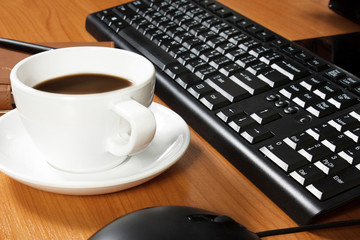 Office desk with coffee cup