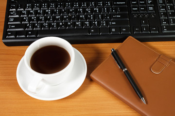 Office desk with coffee cup
