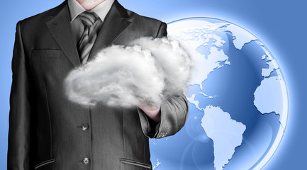 Cloud computing concept, close up of young businessman